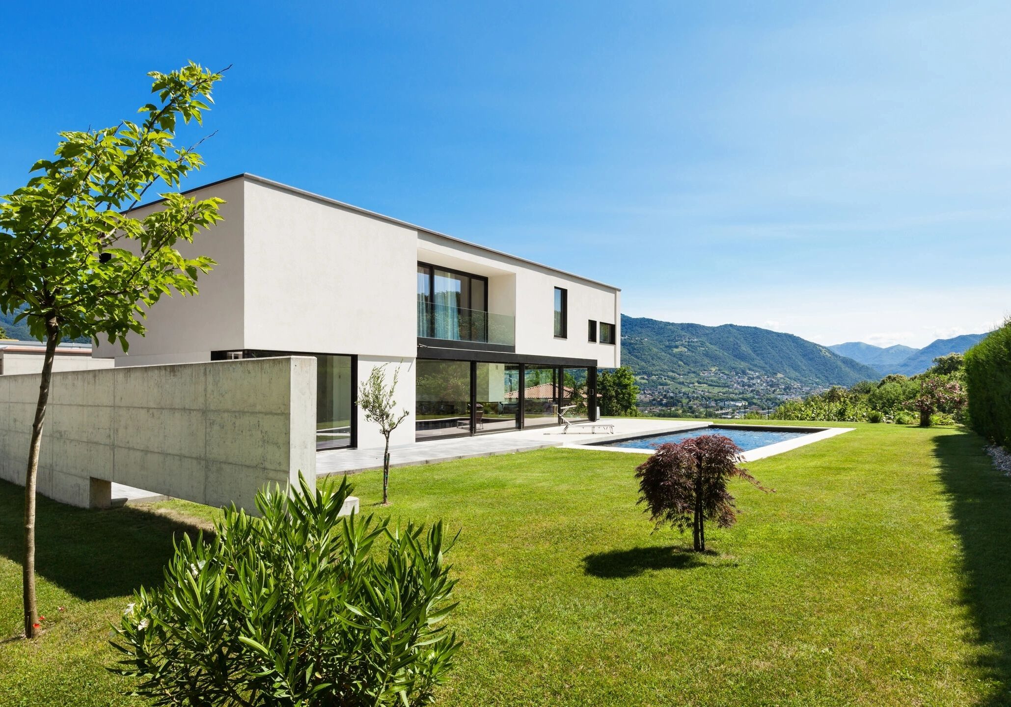 Modern house with pool and mountain view.